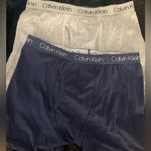 NWOT 2 pairs of Calvin Klein boxer briefs. 1 gray and 1 blue size L, Size 12/14